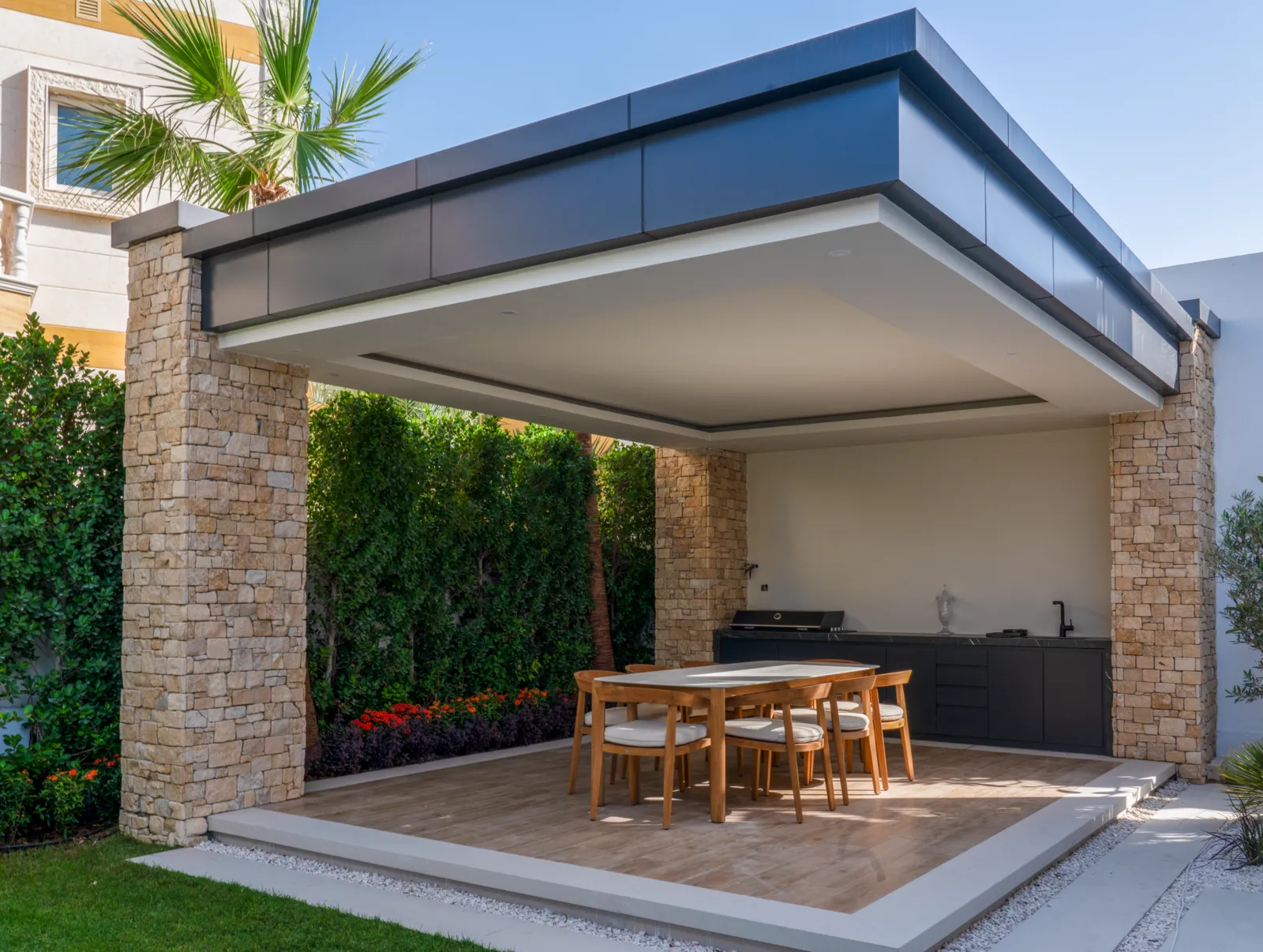 The outdoor kitchen pavilion under its cantilevered roof