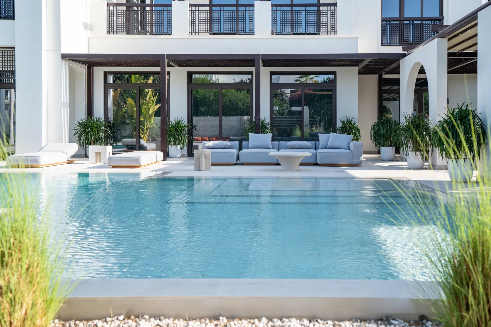 Lounge seating set into the shade of the house